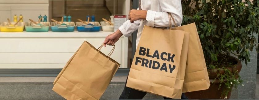 woman holding shopping bags
