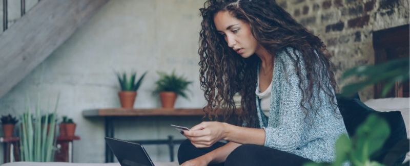Young woman shopping with credit card
