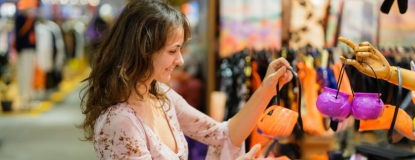 women shopping Halloween decor