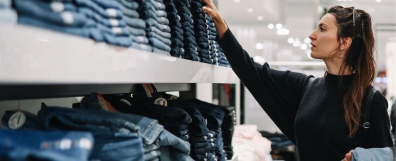 Woman shopping during a Labor Day sale.